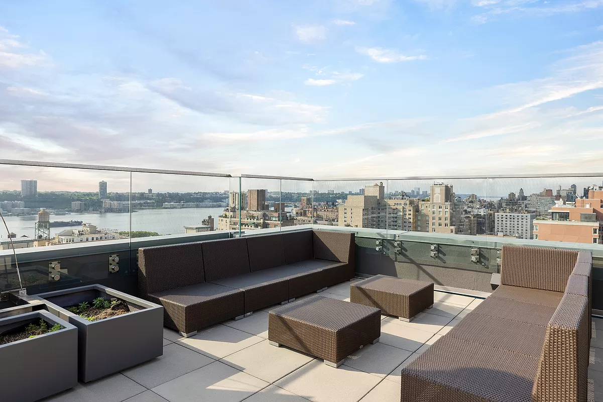 Rooftop Renovation, Manhattan Construction, Outdoor Kitchen Installation, Stone Paving, Glass Railings, Urban Landscaping, NYC Building Codes, Construction Permits, Modern Outdoor Spaces, Durable Pavers.