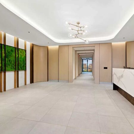 Lobby Renovation, Manhattan Construction, Custom Reception Desk, Modern Interior Design, Green Wall Installation, Premium Flooring, Contemporary Wall Paneling, NYC Building Codes, Construction Permits, Luxurious Lobbies.